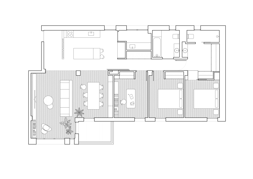 Furnished floor plan of the renovated apartment showing living, dining, kitchen, bedrooms and service spaces.